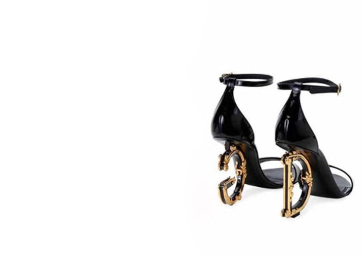 Gold high heels.