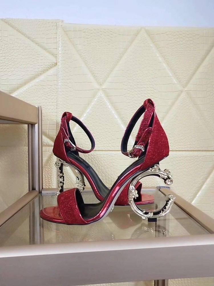 Gold high heels.