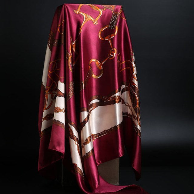 Elegant silk scarf featuring a stylish leopard print pattern, perfect for fashion-forward accessories.