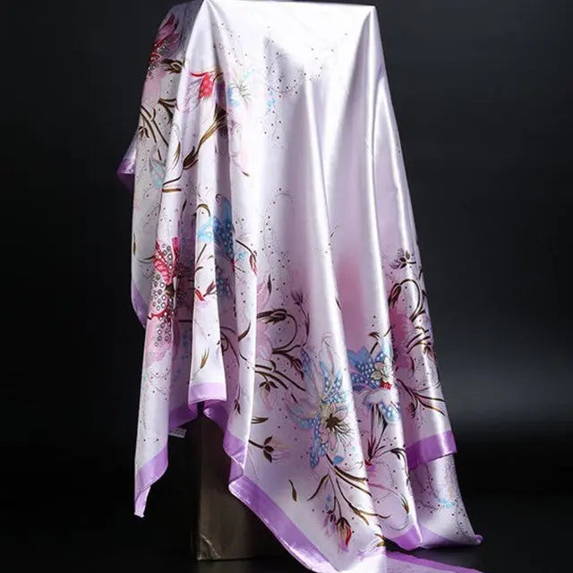 Elegant silk scarf featuring a stylish leopard print pattern, perfect for fashion-forward accessories.