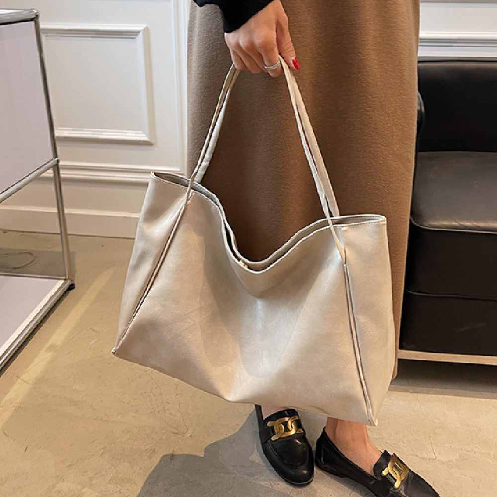 Championnet – Sac fourre-tout vintage & élégance sportive - Gena Campbell