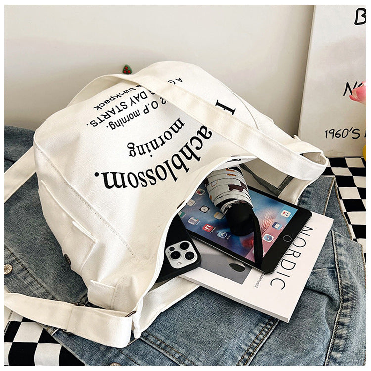 Letter canvas bag, women's new trendy tote bag, student class large capacity crossbody bag.