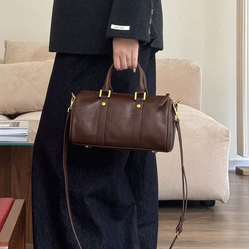 Retro Portable Cowhide Crossbody Bag.