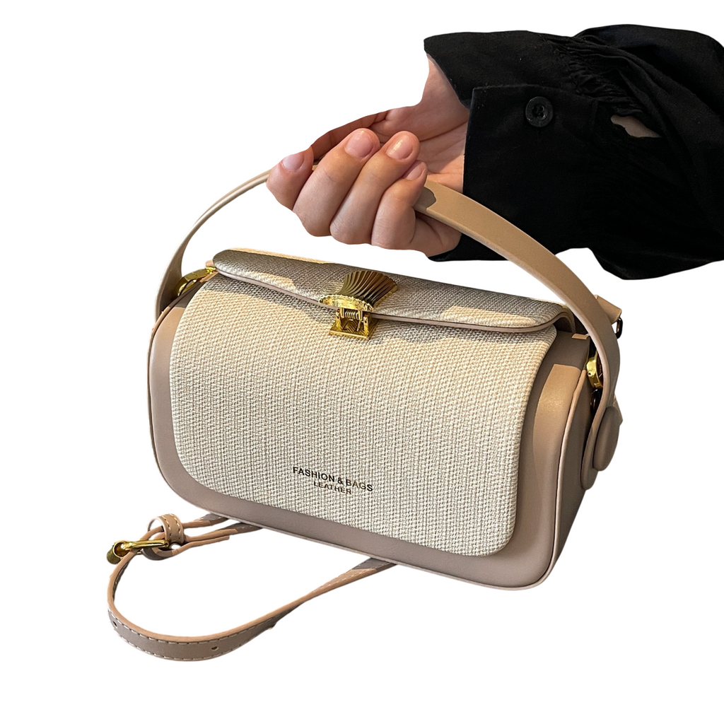 <img src="https://genacampbell.fr/images/Sac_main_structur_haut_de_gamme_1_-Photoroom.jpg" alt="Le Chaussée-d’Antin · Sac messager structuré en similicuir · Création Gena Campbell · Urbain, élégant, format tablette avec bandoulière">
